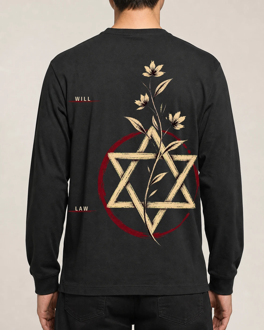 Black long sleeve shown from the back with the Will of the Law floral star composition